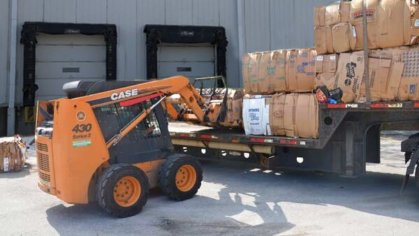 cardboard bale loading industrial recycling