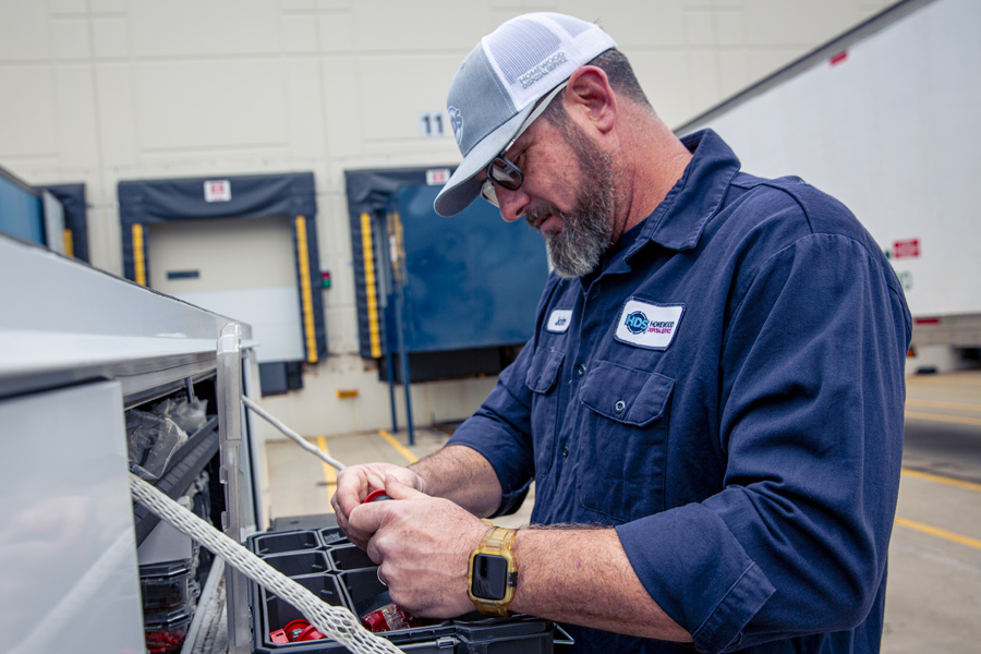 Industrial-Compactor-maintenance-tech on site