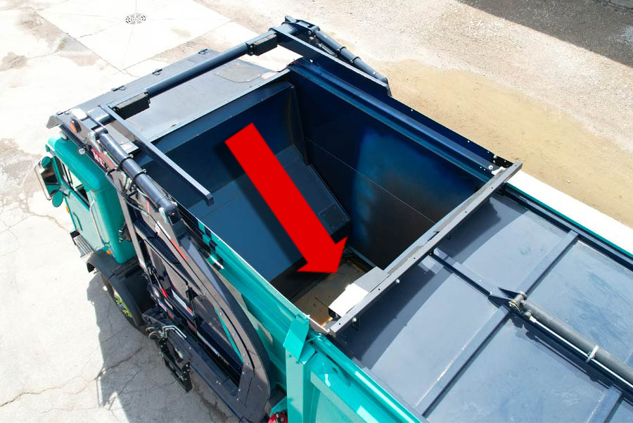 smashing garbage truck