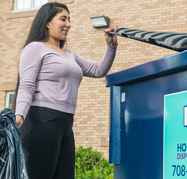 Commercial-Garbage-customer-using-dumpster