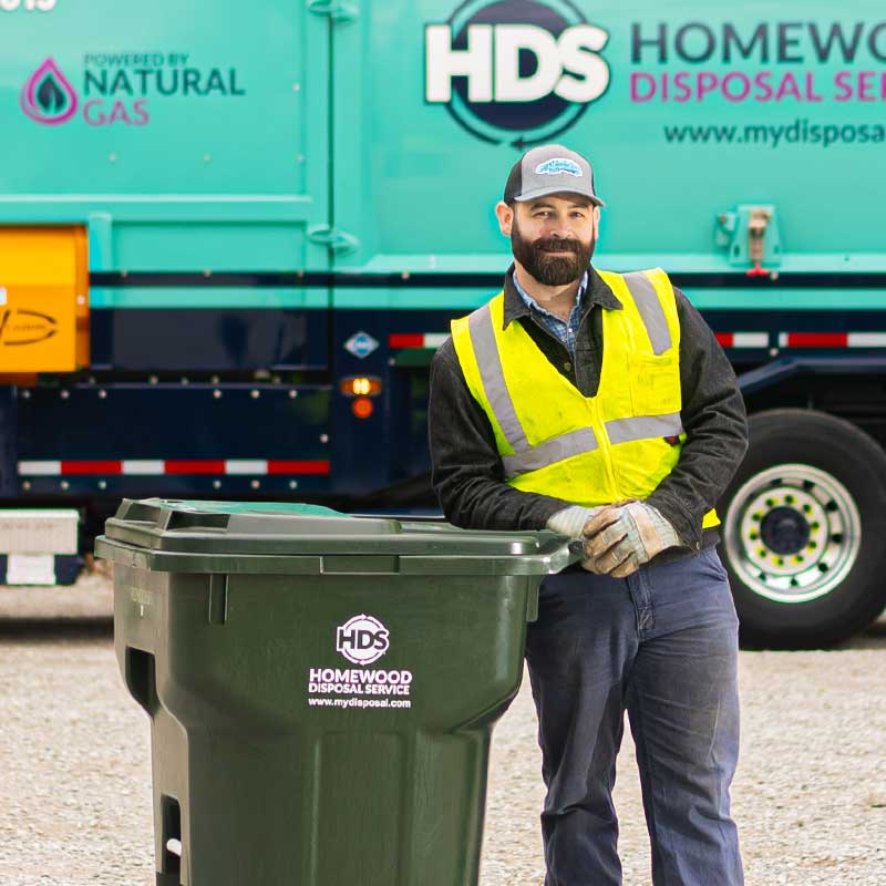 omewood-Disposal-Garbage-Collector-in-front-of-truck800