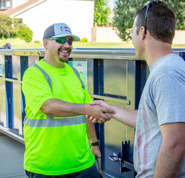 Roll-Off-Dumpster-Driver-with-customer
